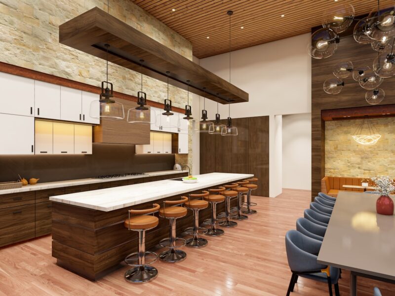 a large kitchen with a long counter and bar stools