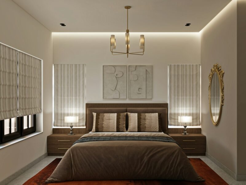 Modern bedroom with elegant bed, lighting, and decorative mirror.