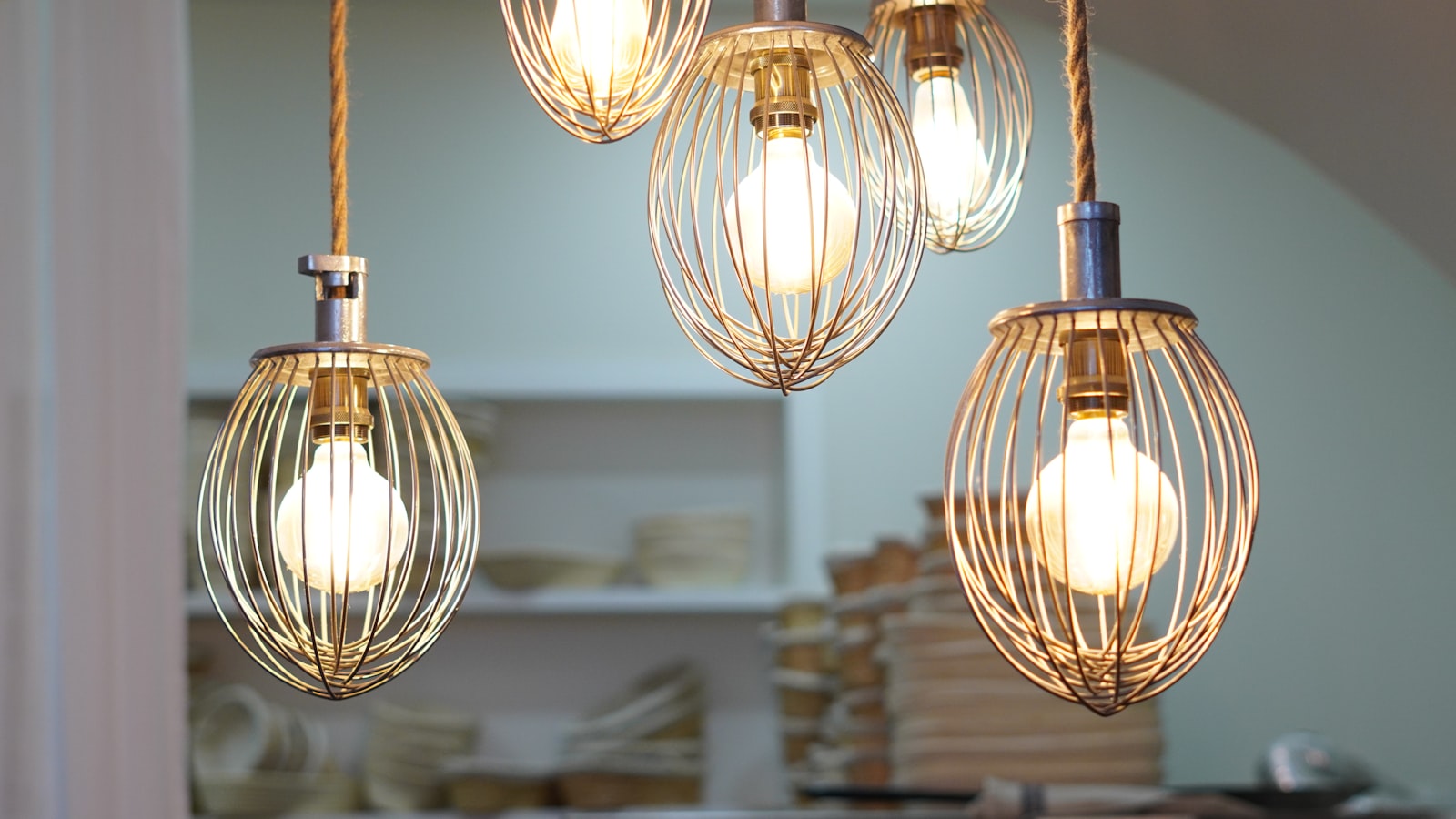 A bunch of lights that are hanging from a ceiling