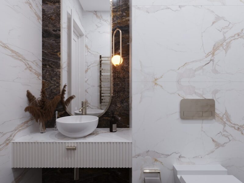 a bathroom with a sink and mirror