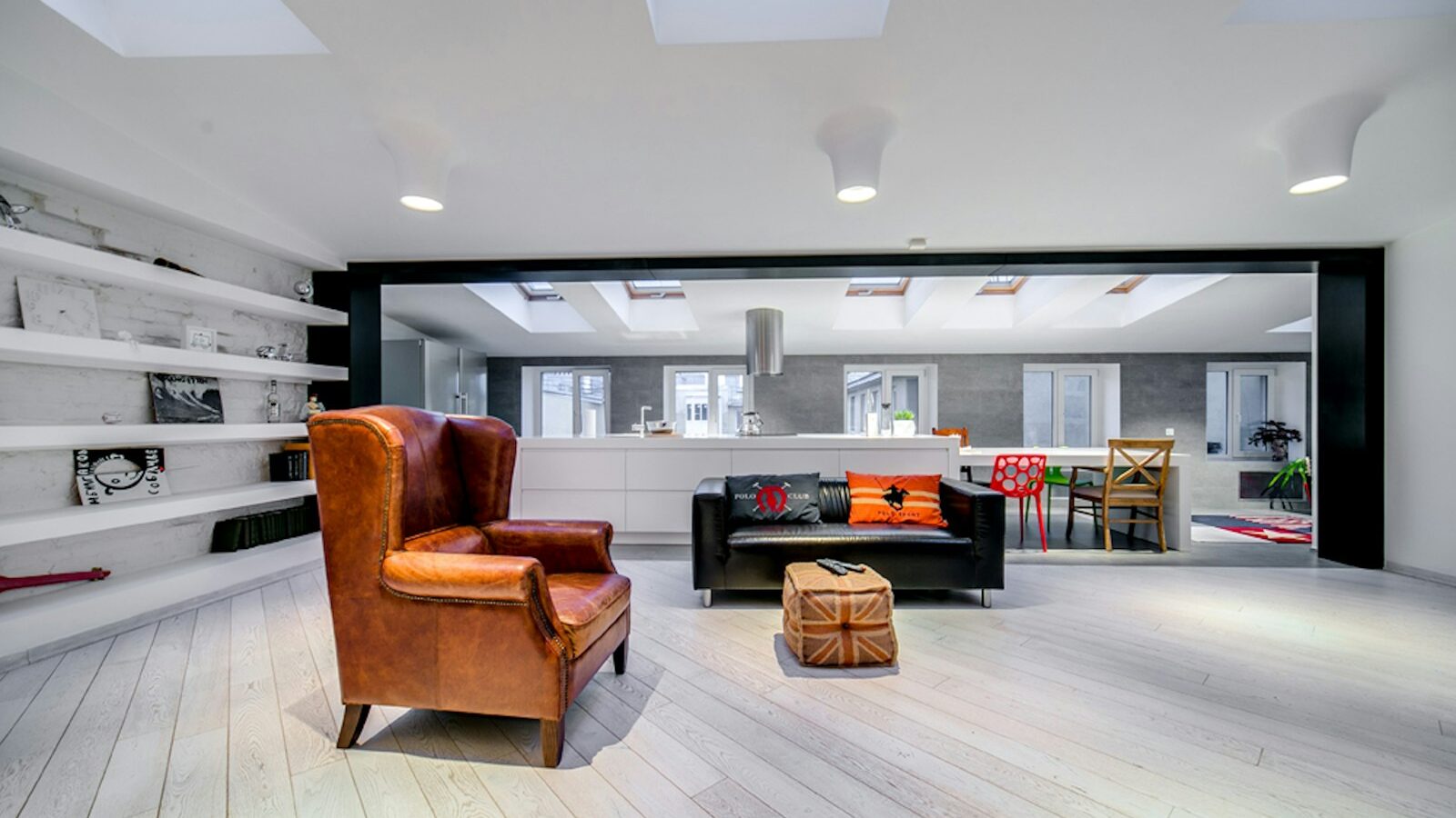 a living room filled with furniture and a fire place