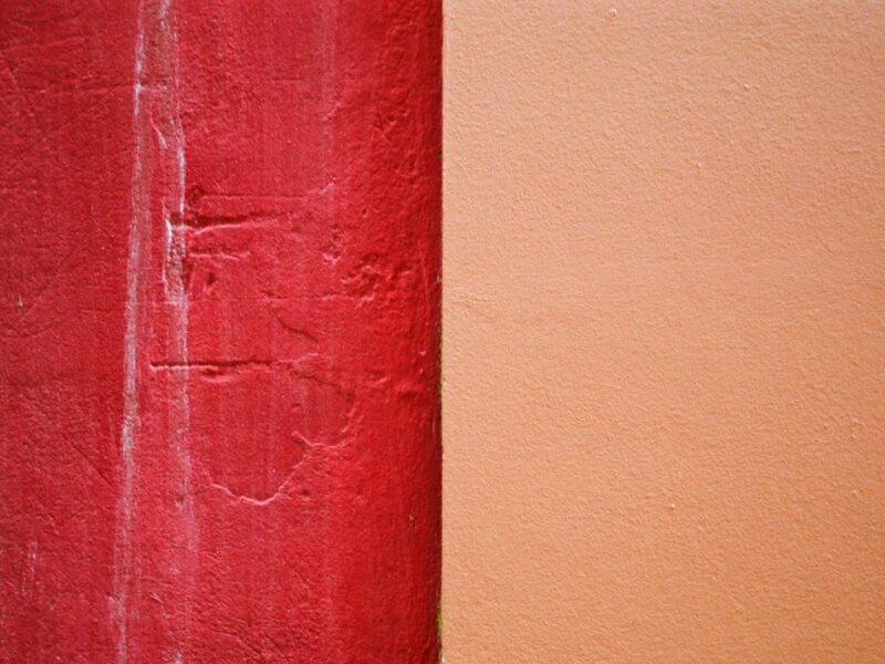 red concrete wall during daytime
